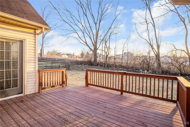 wooden deck featuring fence