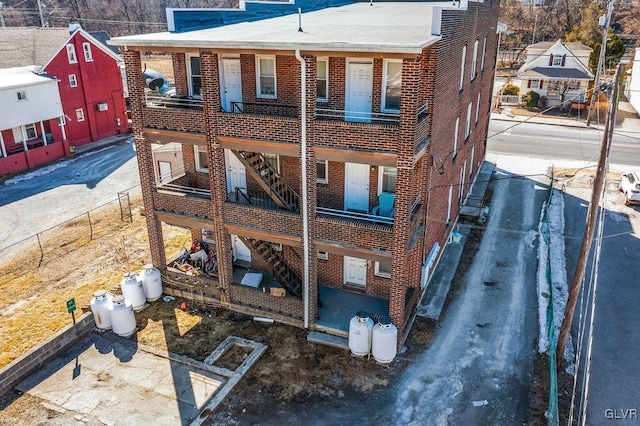 view of front of property featuring brick siding