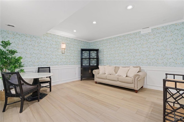 living room with recessed lighting, light wood finished floors, wainscoting, and wallpapered walls