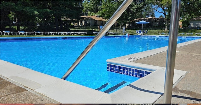 community pool with fence