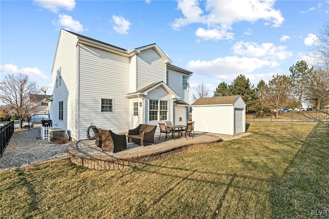 rear view of property featuring central AC unit, a yard, a fenced backyard, an outdoor structure, and a patio area