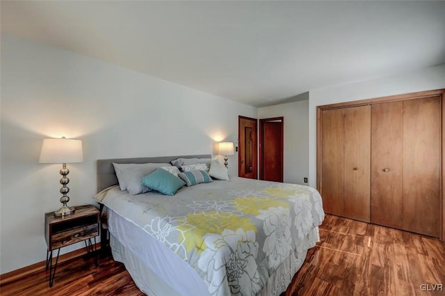 bedroom featuring a closet and wood finished floors