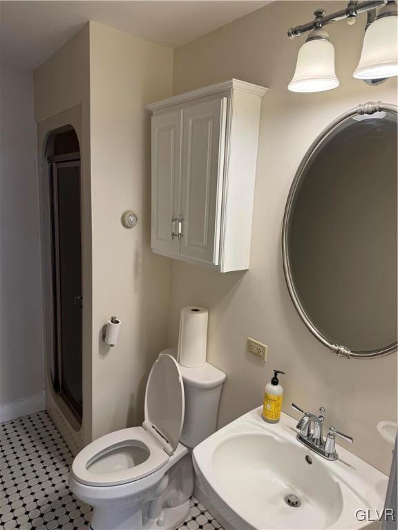 bathroom with a sink and toilet