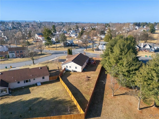 birds eye view of property with a residential view