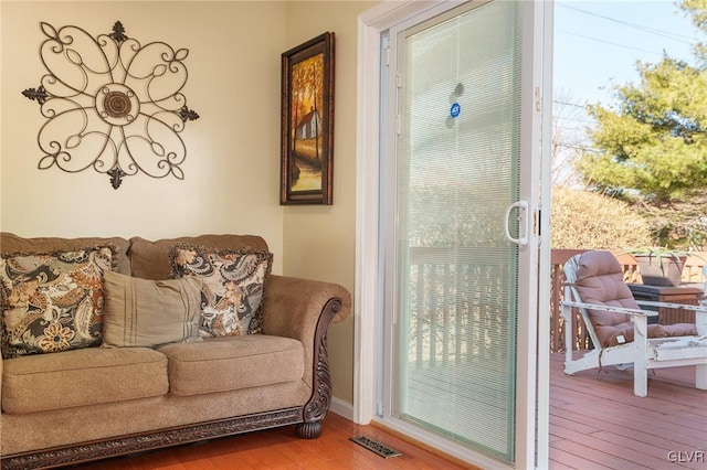 entryway featuring visible vents and hardwood / wood-style floors