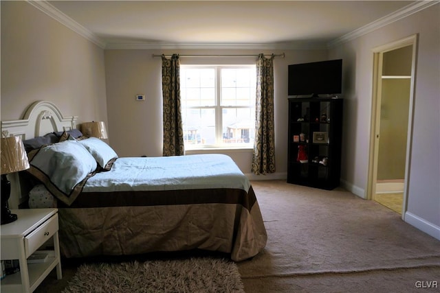 bedroom featuring baseboards, carpet flooring, and crown molding