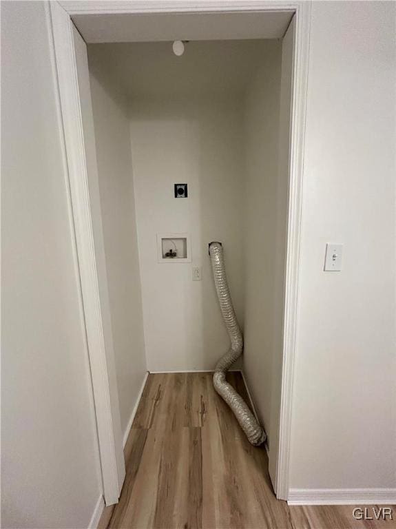 washroom featuring baseboards, laundry area, hookup for a washing machine, light wood-style flooring, and hookup for an electric dryer