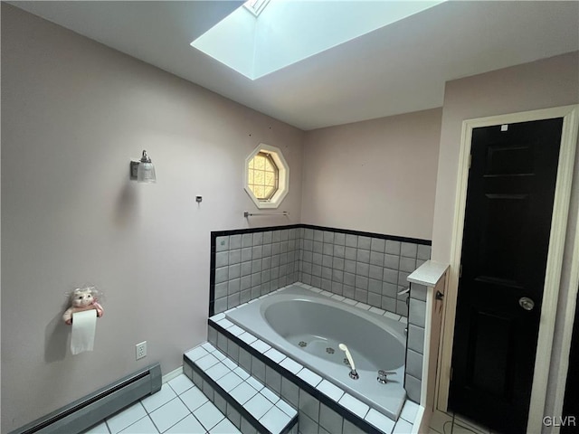 full bath featuring a tub with jets, baseboards, a skylight, a baseboard heating unit, and tile patterned floors