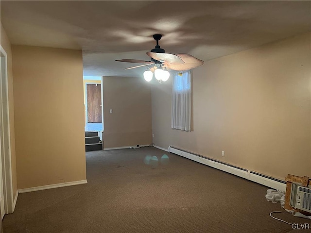 carpeted spare room with a baseboard radiator, baseboards, and ceiling fan