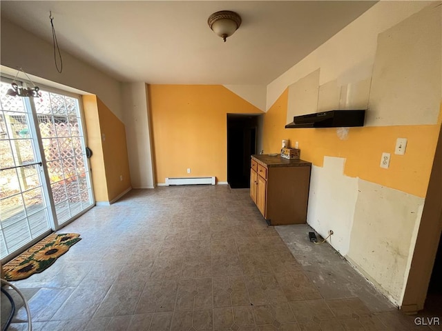 kitchen featuring under cabinet range hood, a baseboard heating unit, and vaulted ceiling