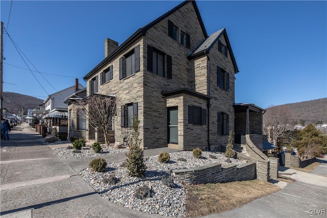 view of front of house with a chimney