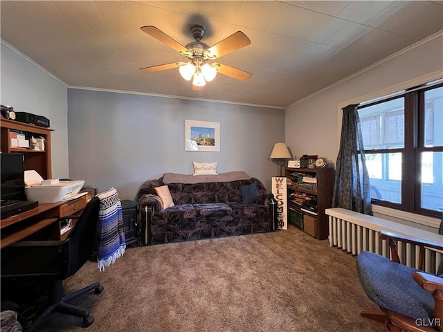 home office with crown molding, carpet flooring, and ceiling fan