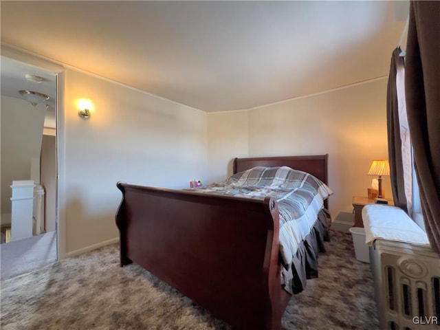 carpeted bedroom featuring baseboards