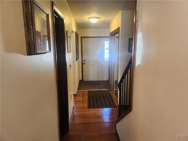 hall with wood finished floors