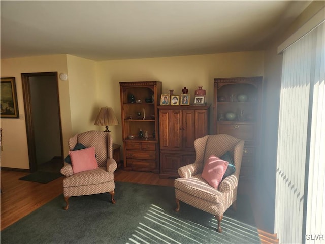 living area with wood finished floors