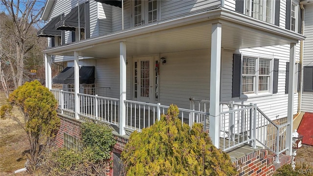 entrance to property with covered porch