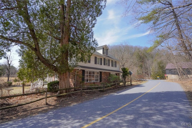 exterior space with brick siding