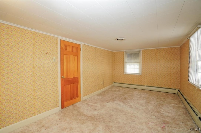 carpeted spare room with visible vents, wallpapered walls, and a baseboard radiator