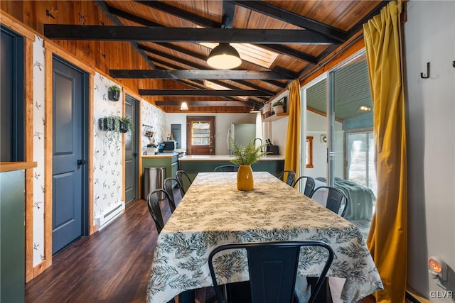 dining room featuring vaulted ceiling with skylight, wood ceiling, and dark wood finished floors