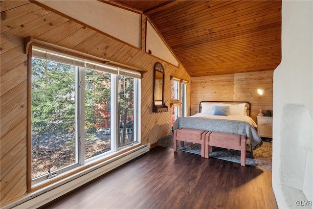 bedroom featuring vaulted ceiling, wooden walls, dark wood-type flooring, and a baseboard radiator