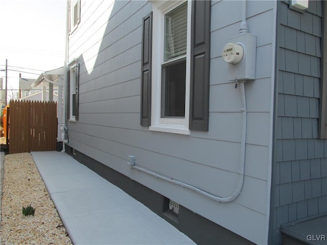 view of property exterior with fence