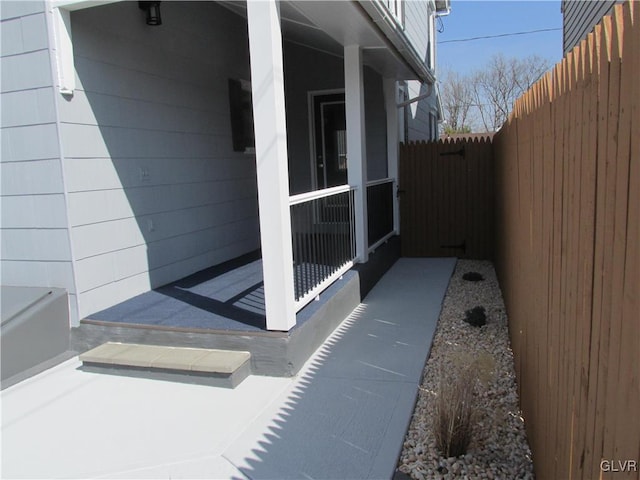 view of home's exterior featuring fence