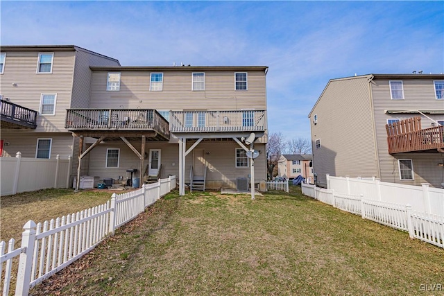 back of property featuring cooling unit, a lawn, and a fenced backyard