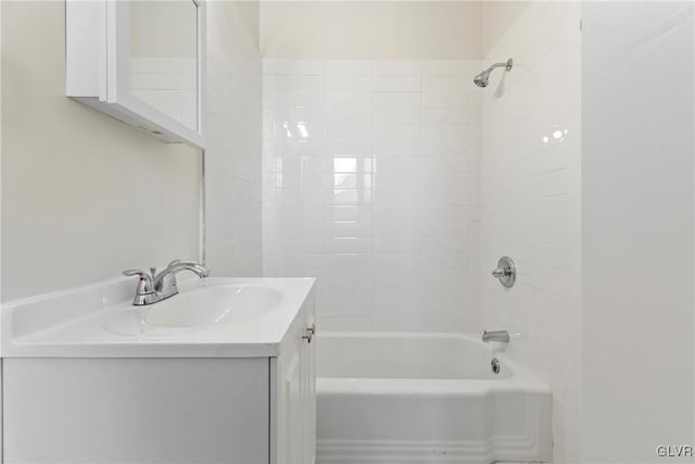 bathroom with vanity and shower / bathing tub combination