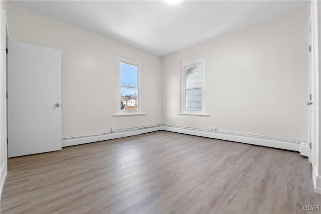 empty room featuring wood finished floors