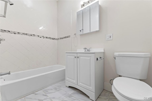 full bath with shower / washtub combination, marble finish floor, toilet, and vanity