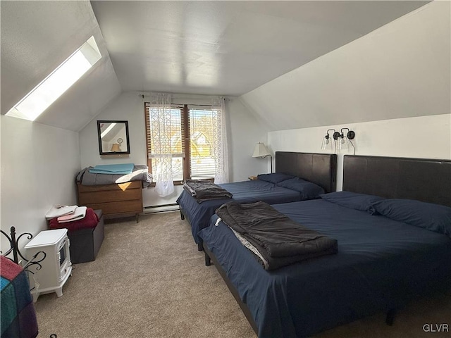 bedroom with a baseboard heating unit, lofted ceiling, and carpet