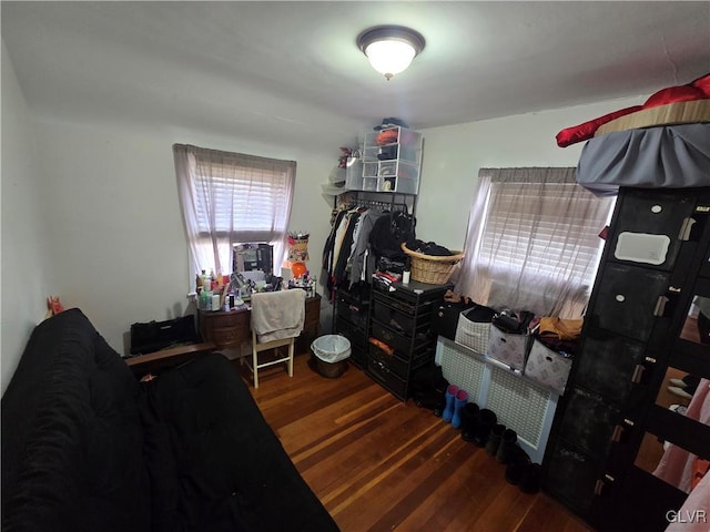 bedroom featuring wood finished floors