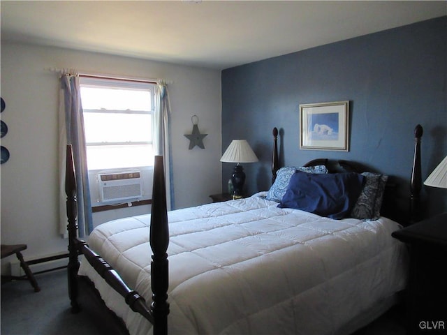 bedroom with a baseboard heating unit, cooling unit, and carpet flooring