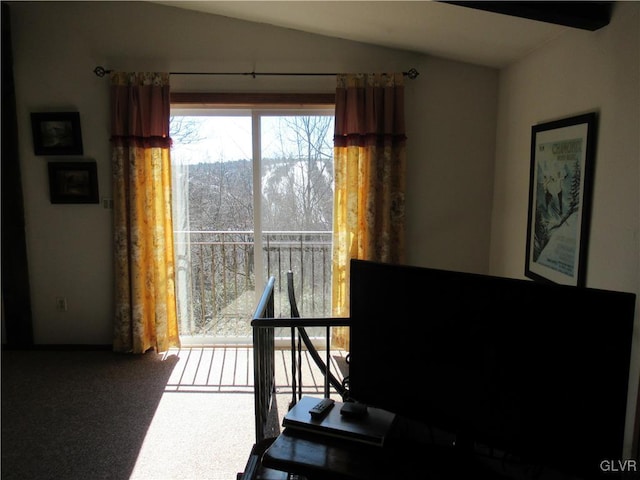 office area with vaulted ceiling