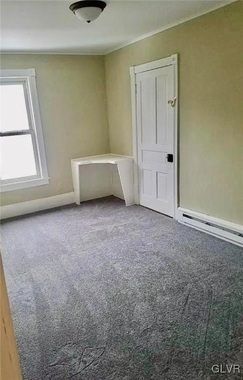 515 N Railroad St, Tamaqua Borough, PA 18252 - carpeted empty room featuring baseboards and a baseboard radiator