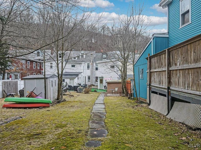 129 W Broadway, Jim Thorpe Boro, PA 18229 - view of yard featuring a storage unit, an outdoor structure, and a residential view