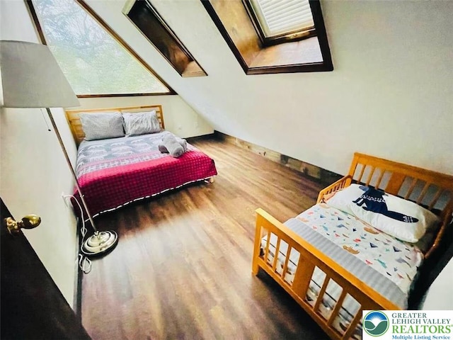 156 Poplar Pl, Tunkhannock Township, PA 18610 - bedroom featuring wood finished floors and a skylight