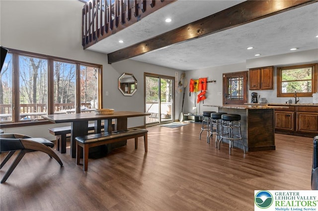156 Poplar Pl, Tunkhannock Township, PA 18610 - dining area with recessed lighting, beamed ceiling, dark wood finished floors, and a textured ceiling