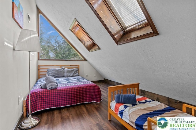 156 Poplar Pl, Tunkhannock Township, PA 18610 - bedroom with a skylight and wood finished floors