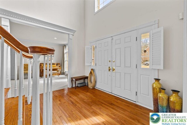 255 Rising Meadow Way E, Stroudsburg, PA 18302 - foyer entrance featuring light wood-type flooring and a high ceiling