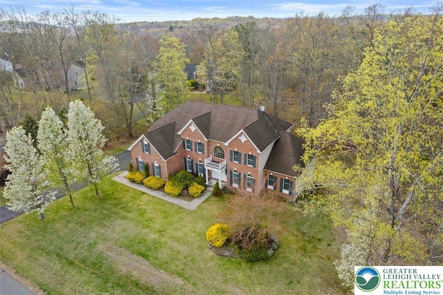 255 Rising Meadow Way E, Stroudsburg, PA 18302 - view of subject property with a heavily wooded area