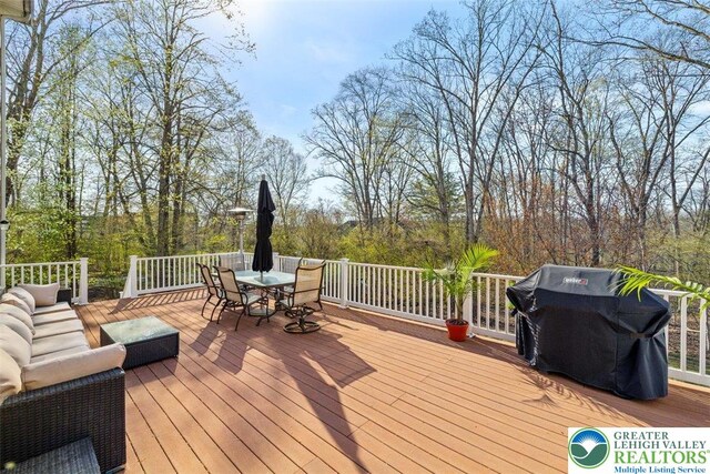 255 Rising Meadow Way E, Stroudsburg, PA 18302 - wooden terrace featuring outdoor dining space, area for grilling, and an outdoor living space