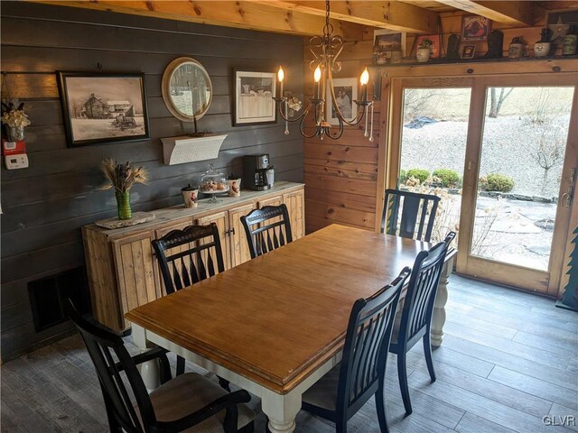 2533 Williams Rd, Moore Twp, PA 18014 - dining room with wooden walls, beam ceiling, a chandelier, wood finished floors, and visible vents