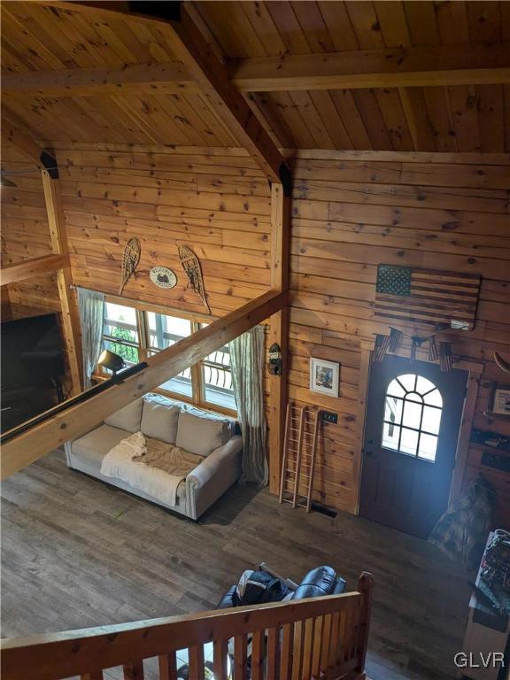 2533 Williams Rd, Moore Twp, PA 18014 - living area featuring wooden walls, beam ceiling, wood ceiling, and wood finished floors