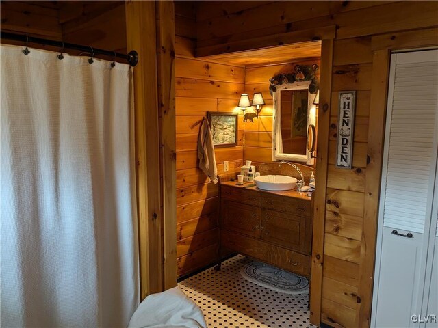 2533 Williams Rd, Moore Twp, PA 18014 - full bath with vanity, wooden walls, and a shower with curtain