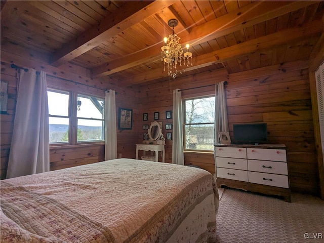 2533 Williams Rd, Moore Twp, PA 18014 - carpeted bedroom featuring wooden walls, wood ceiling, beam ceiling, and a notable chandelier