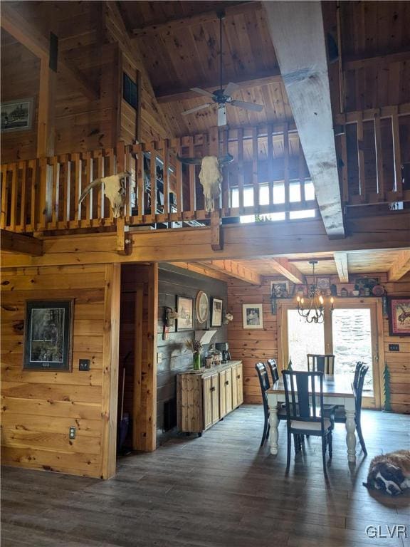 2533 Williams Rd, Moore Twp, PA 18014 - dining space with beamed ceiling, wood walls, and wood finished floors