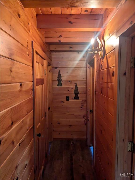 2533 Williams Rd, Moore Twp, PA 18014 - hall with wooden walls, wooden ceiling, beamed ceiling, and wood finished floors