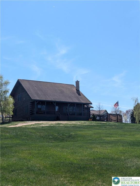 2533 Williams Rd, Moore Twp, PA 18014 - rear view of property featuring a yard and a chimney