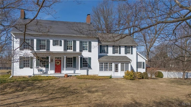 112 Pleasant Grove Rd, Nj, NJ 07853 - colonial house with a front yard, a porch, a chimney, and fence